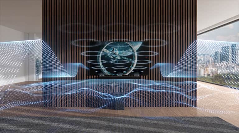 Z soundbaru i telewizora wydobywają się różne niebieskie fale dźwiękowe.