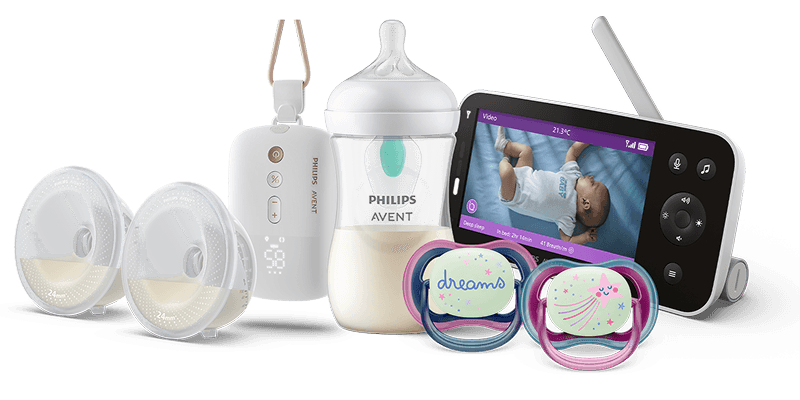 Laktator z muszlami, butelka, smoczki i elektroniczna niania Philips Avent.