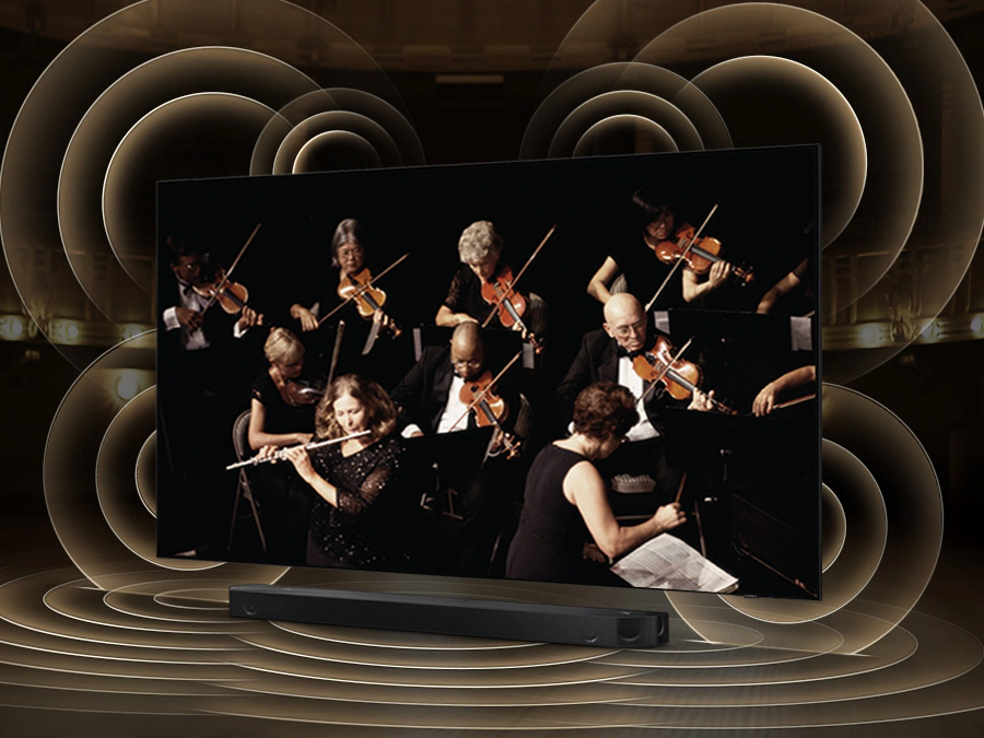 Simulated sound wave graphics from TV and soundbar demonstrate Q Symphony technology as they play sound together. QN95BATXXH