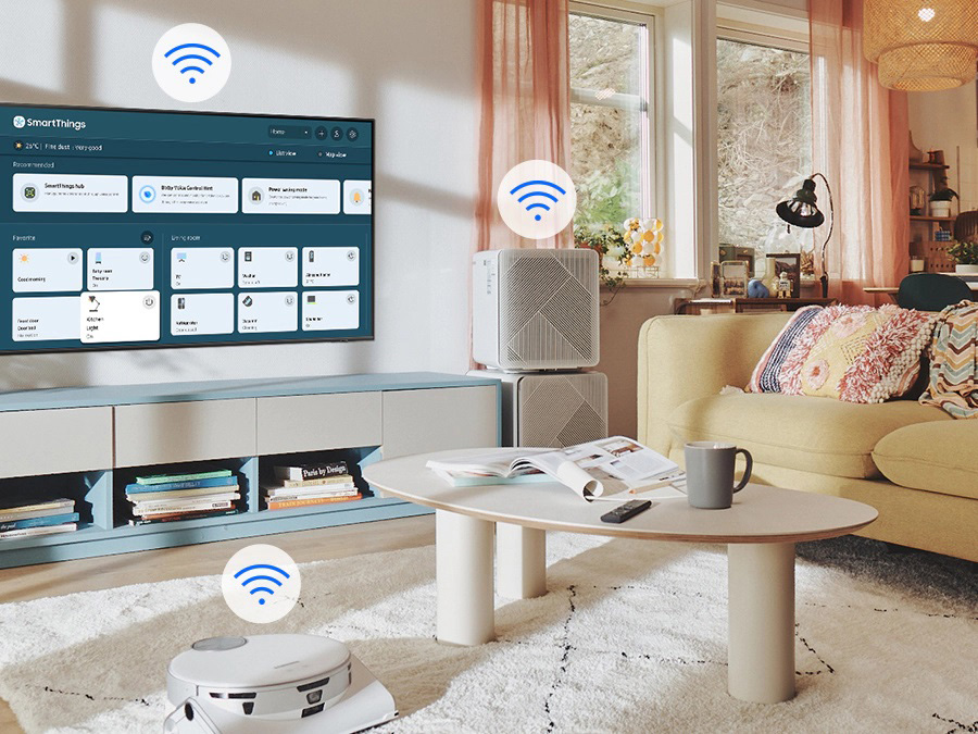Telewizor Neo Qled 8K Samsung  wiszący w na ścianie połączony dzięki funkcji SmartThings z innymi urządzeniami w pomieszczeniu. QN700BTXXH