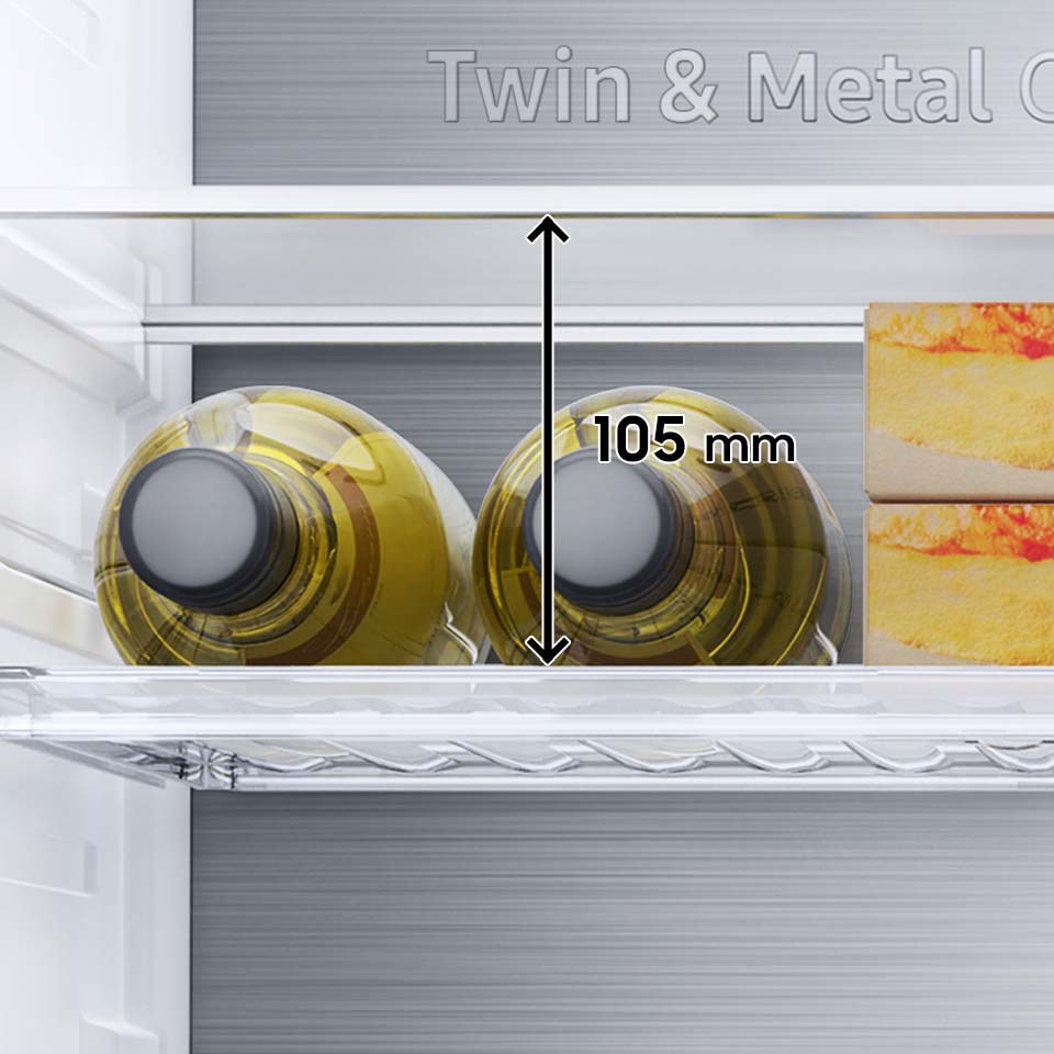 między półką na butelki a półką ponad nią jest 105 mm odstępu