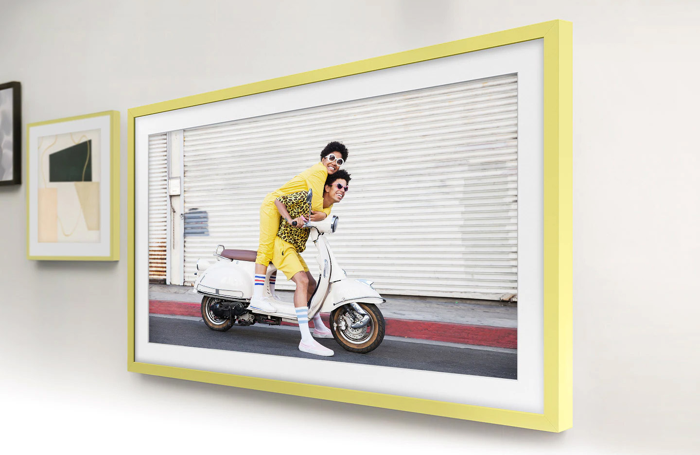 The Frame is hanging on the wall along with other picture frames, which makes The Frame look like a photo on the wall. LS03BBUXXH