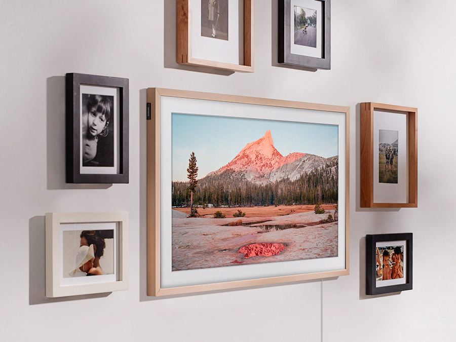 The Frame is hanging on a wall via a Slim Fit Wall Mount to look like a real picture frame. LS03BBUXXH